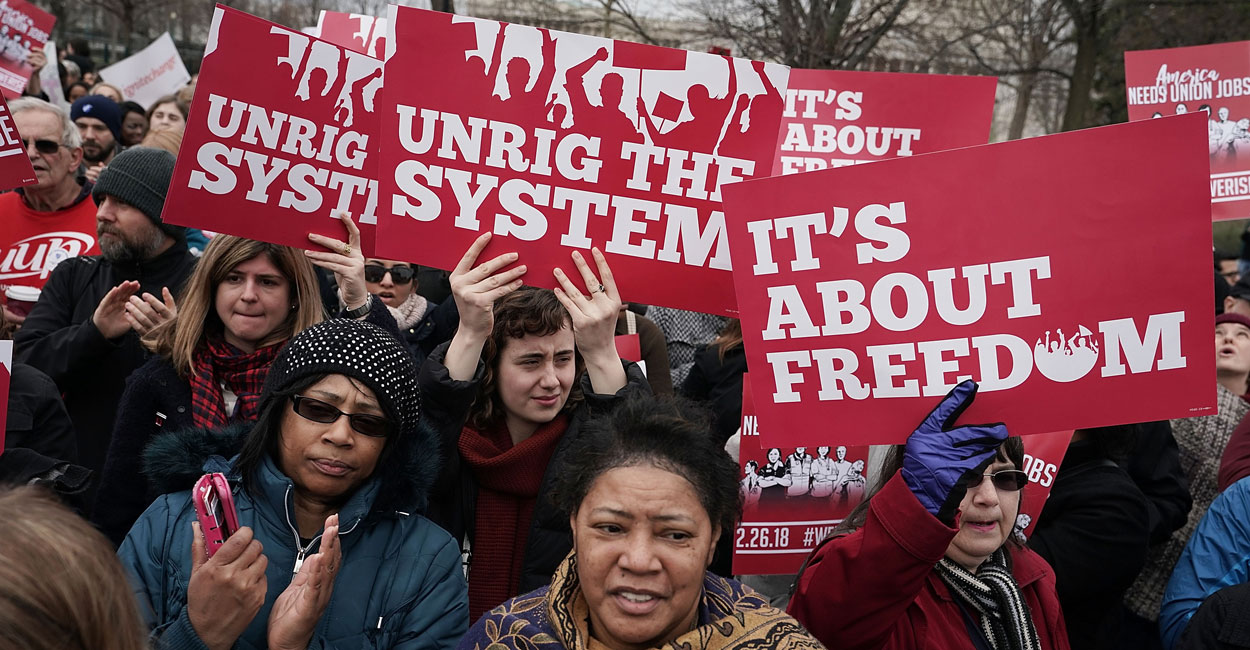 Activists rally in front of the Supreme Court on Feb. 26, 2018 in Washington, D.C. The court was scheduled to hear the case, Janus v. AFSCME, to determine whether states violate their employees' First Amendment rights to require them to join public sector unions which they may not want to associate with. (Photo: Alex Wong/Getty Images)