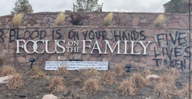 Focus on the Family sign with graffiti reading 