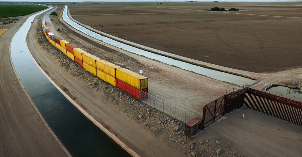 Empty shipping containers along the U.S.-Mexico border in Arizona