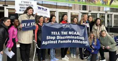 women protest NCAA rule allowing males to compete in women's sports
