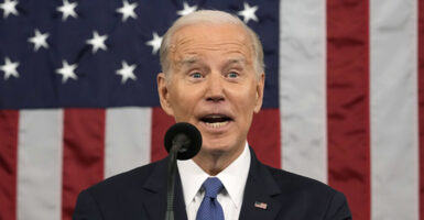 Joe Biden mouth open U.S. flag