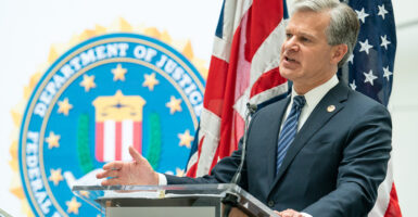 Christopher Wray and Federal Bureau of Investigation logo