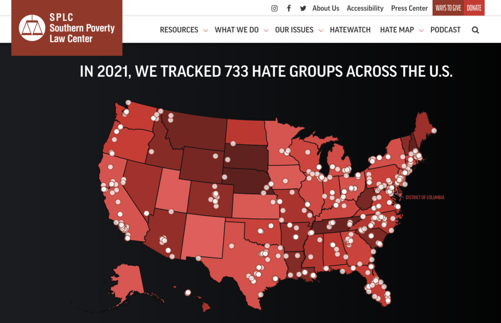 Red map of the United States with SPLC "hate groups" plotted on it