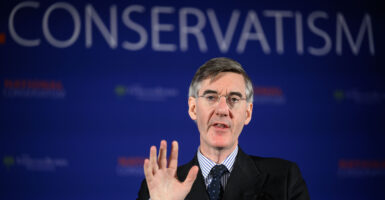 Conservative MP Jacob Rees-Mogg delivers address.
