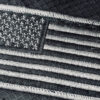 A flag patch on a military uniform.