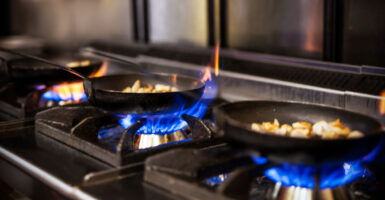 Pans on a gas stove.