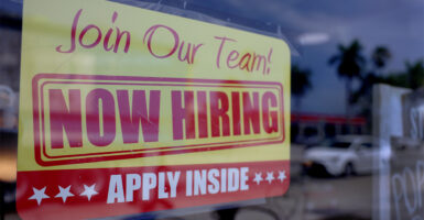 help wanted sign on a storefront