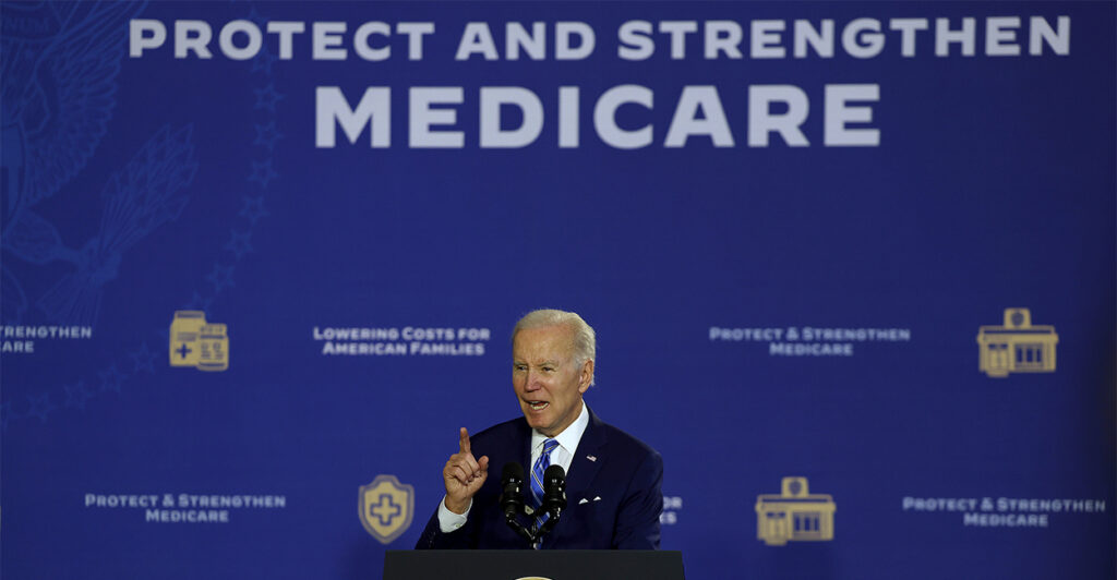 President Joe Biden discusses Medicare on stage