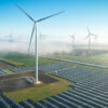Solar panels and wind turbines in fog