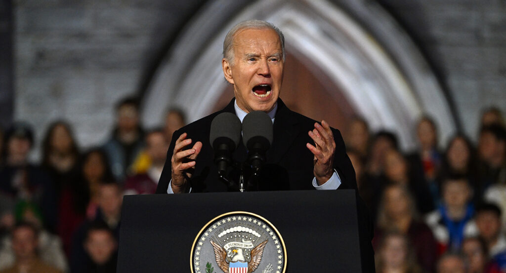 Joe Biden shouts angrily in front of a church