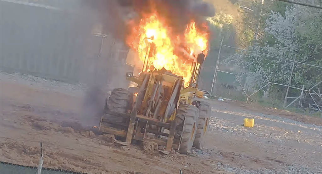 tractor on fire after Antifa attack