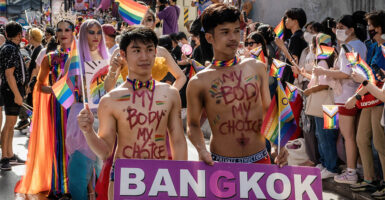 Men parading for Bangkok Rainbow Organization