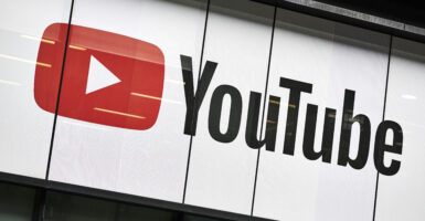 YouTube has censored the story of a young woman who underwent an irreversible surgery as part of an attempted gender transition. Meanwhile, pro-transgender videos of biological women who underwent double mastectomies remain on the platform uncensored. Pictured: Detail of the YouTube logo outside the YouTube Space studios in London, taken on June 4, 2019. (Photo by Olly Curtis/Future via Getty Images)
