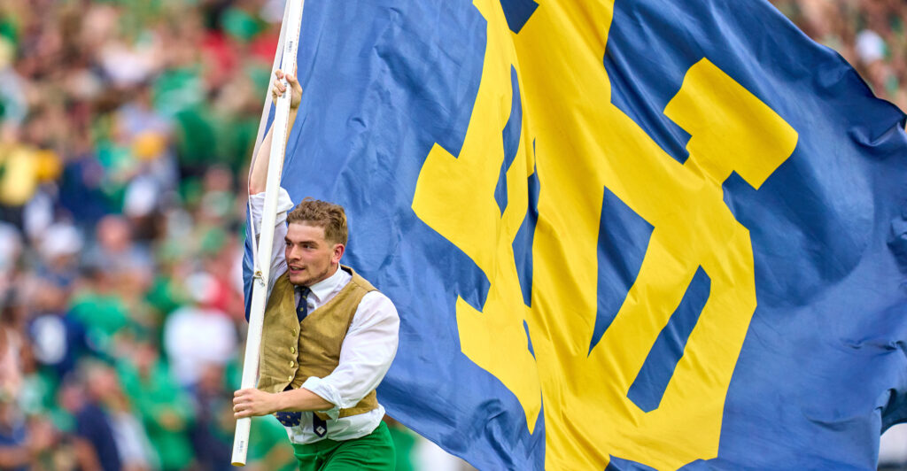 A pro-abortion Notre Dame professor is suing the student newspaper that reported on her far-left abortion remarks, claiming that the reporting subjected her to harassment. Pictured: Notre Dame Fighting Irish mascot The Leprechaun runs with the Notre Dame Fighting Irish flag during a game between the Notre Dame Fighting Irish and the Cincinnati Bearcats on October 2, 2021, in South Bend, IN. (Photo by Robin Alam/Icon Sportswire via Getty Images)