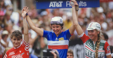 An international cycling union has formally banned biological men who identify as transgender women from competing in women's events. Pictured: Jeannie Longo of France (second place), Valerie Simmonet of France (first place) and Inga Thompson of the USA and 7-Eleven team (third place) celebrate on the podium following the Vail Criterium stage of the 1985 Coors International Bicycle Classic on August 11, 1985 in Vail, Colorado. (Photo by David Madison/Getty Images)