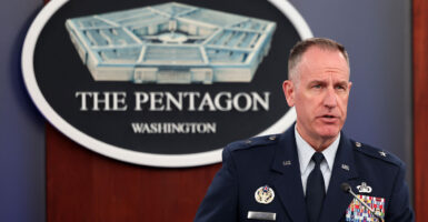 Brig. Gen. Pat Ryder speaks at a news conference with Pentagon logo in background