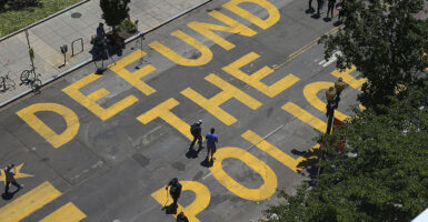16th Street in Washington, D.C., reads "Defund the Police"