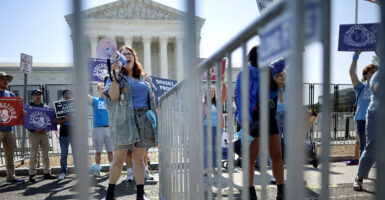 pro-life activists protest at the Supreme Court