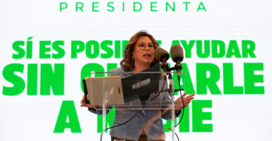 Guatemalan candidate for president and former First Lady Sandra Torres speaks at a podium