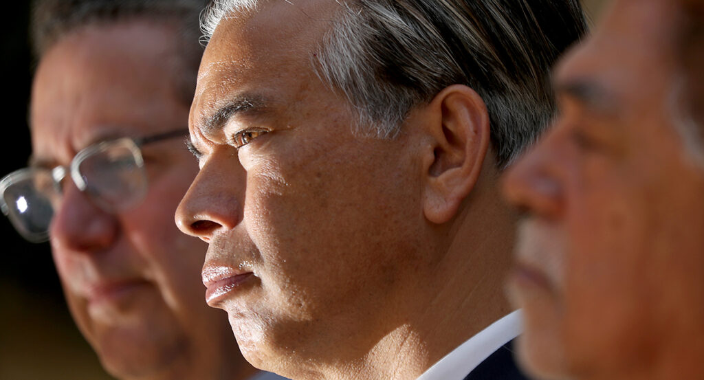 California Attorney General Rob Bonta looks to the left