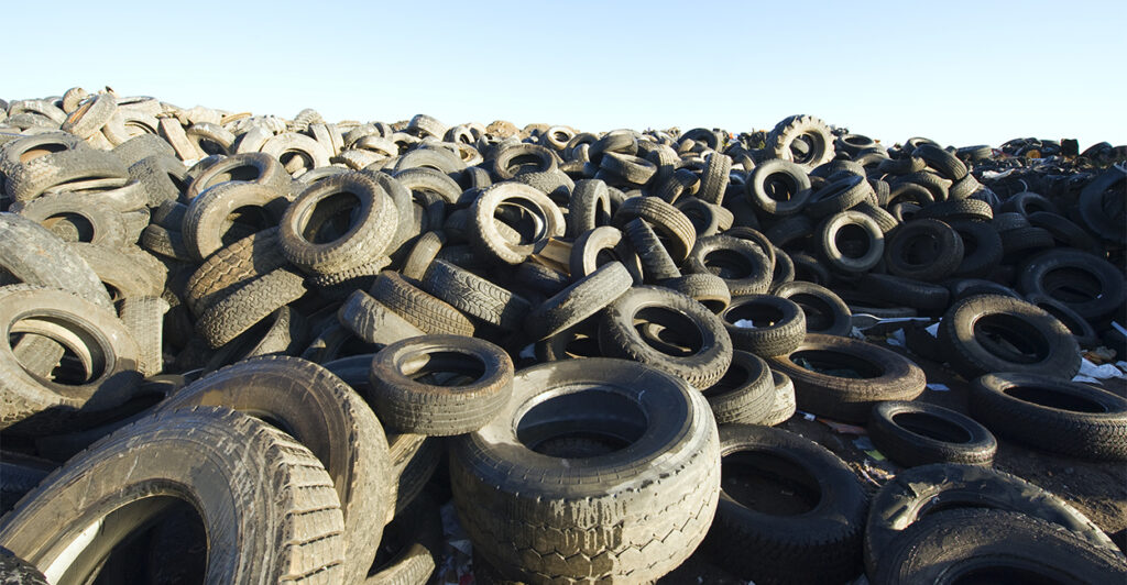 A large pile of used tires