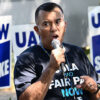 A local UAW president speaks on a picket line