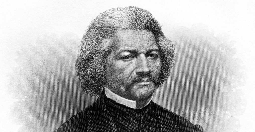 A black and white photo of a historic engraving of Frederick Douglass, seated.