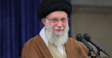 Ayatollah Ali Khamenei in clerical robes