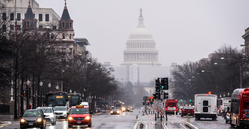 Rainy day on streets of Washington with the US Capitol building in the background