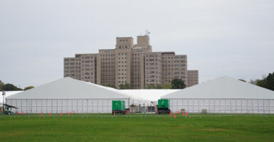 Large emergency tents for illegal aliens set up in front of city buildings in New York