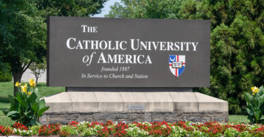 Catholic University of America sign with a crest reading 