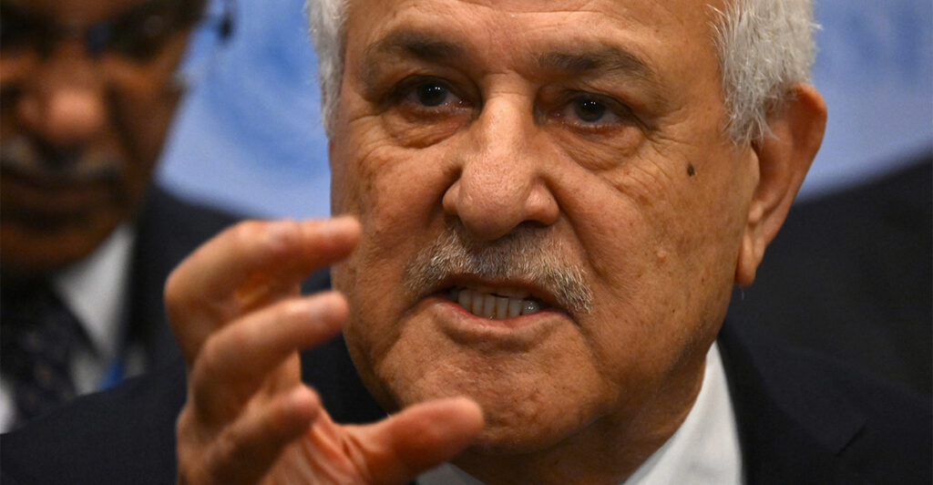 Close-up of Palestinian Ambassador to the United Nations with an angry face and hand raised like a claw