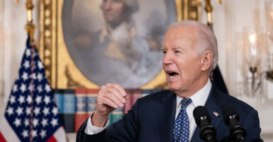 President Joe Biden speaking from a podium in the White House