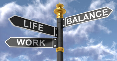 A street sign with three words on it, Life, Work, and Balance.