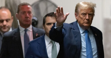 Former President Donald Trump returns to the courtroom following a break for his trial at Manhattan Criminal Court on April 26, 2024 in New York City.