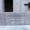 stone front of courthouse engraved with "Supreme Court Of Ohio"
