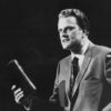 The Rev. Billy Graham holds a Bible in an undated file photo circa 1970.