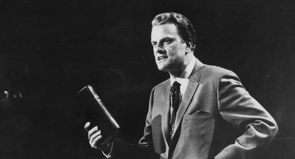 The Rev. Billy Graham holds a Bible in an undated file photo circa 1970.