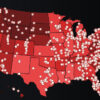 A map of the United States in red with white dots for groups the Southern Poverty Law Center brands "hate groups" or "antigovernment extremist groups."