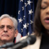 U.S. Attorney General Merrick Garland listened as Assistant Attorney General Kristen Clarke spoke about the DOJ investigation at a press conference Friday, June 16, 2023, Minneapolis, Minn. The Minneapolis Police Department routinely engaged in a pattern of racist and abusive behavior that deprives people of their constitutional rights, according to new findings of a Justice Department investigation prompted by the murder of George Floyd three years ago. (Photo by Glen Stubbe/Star Tribune via Getty Images)