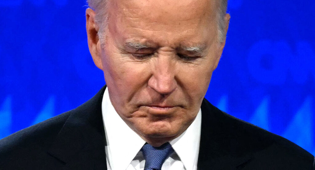 President Joe Biden looks down in the CNN debate