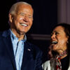Joe Biden and Kamala Harris laughing.