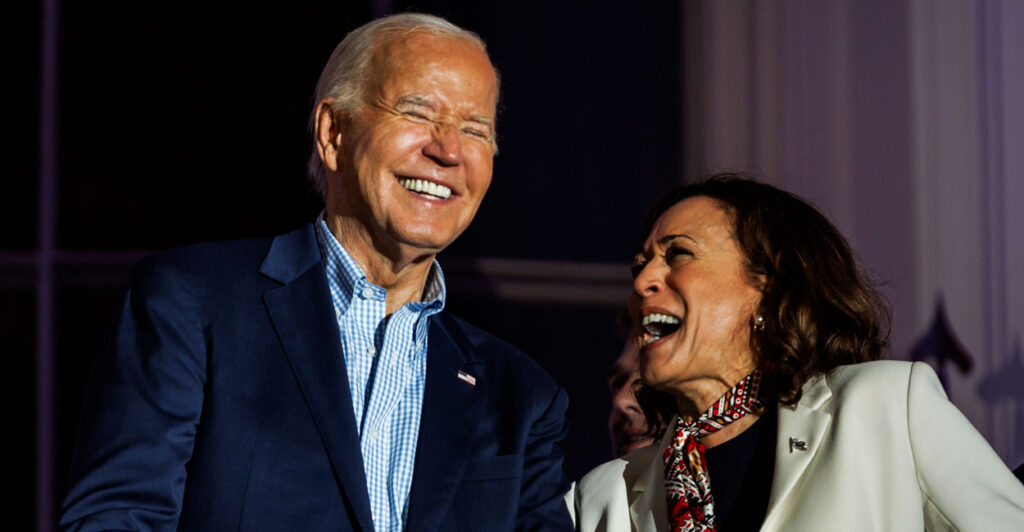 Joe Biden and Kamala Harris laughing.