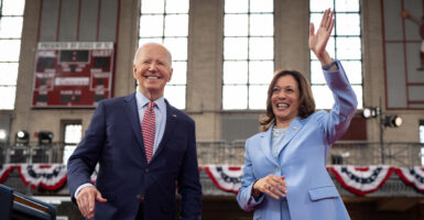 U.S. President Joe Biden and U.S. Vice President Kamala Harris wave to members of the audience after speaking at a campaign rally at Girard College on May 29, 2024 in Philadelphia, Pennsylvania. (Photo by Andrew Harnik/Getty Images)