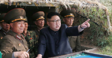 North Korean leader Kim Jong Un and missiles