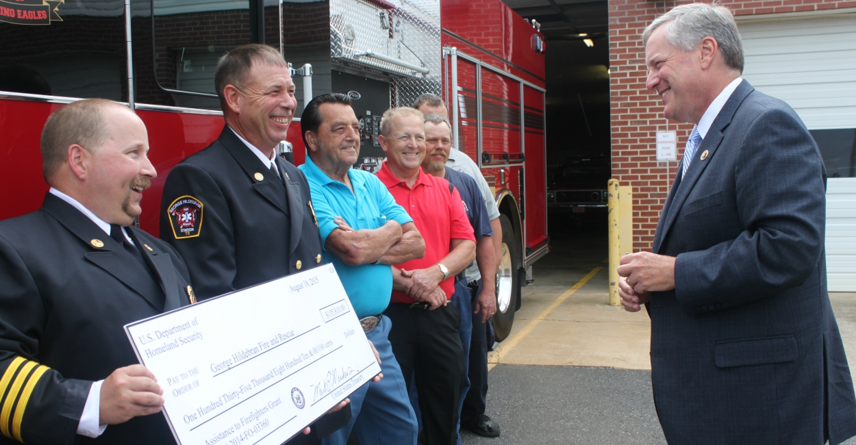 Meadows presents a $153,881 grant from the Federal Emergency Management Agency to George Hildebran Fire and Rescue. "We got your back," Meadows says. (Photo: Josh Siegel/The Daily Signal)