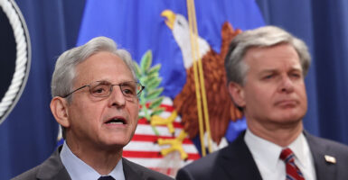 Attorney General Merrick Garland and FBI Director Christopher Wray