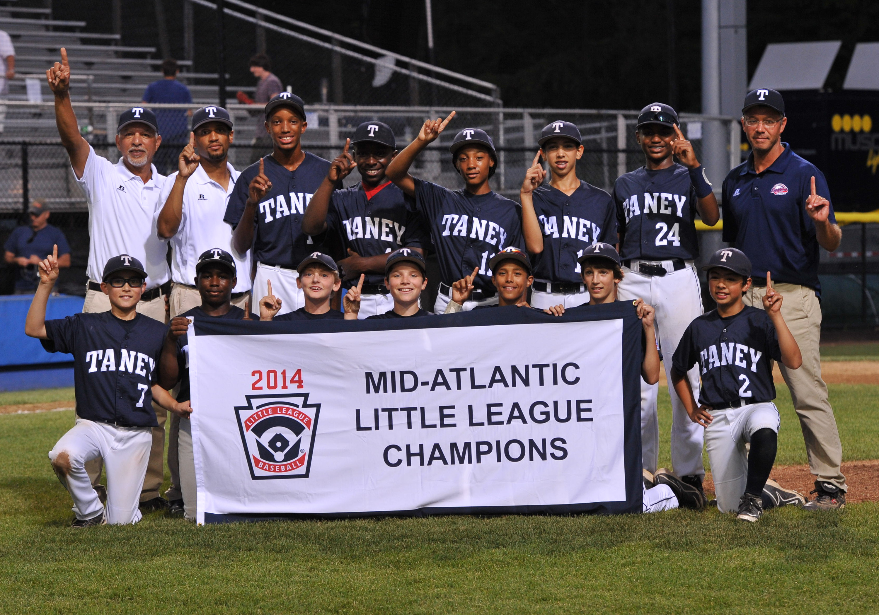 After Mo'ne's Taney Youth Little League team beat Delaware 8-0 in the 2014 Mid Atlantic Championship game Aug. 10. (Photo: Newscom)