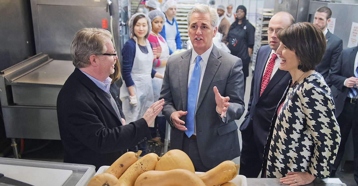 Mike Curtin, left, CEO of DC Central Kitchen, gives a tour of the facility to House Majority Leader Kevin McCarthy, R-Calif., Rep. Jason Smith, R-Mo., and Conference Chair Cathy McMorris Rodgers, R-Wash., in advance of the upcoming vote on the Fighting Hunger Incentive Act, Feb. 10, 2015. (Photo: Tom Williams/CQ Roll Call) 
